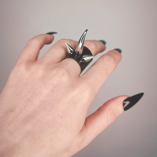 Gothic spiked gloss black PVC ring, featuring a central claw spike.