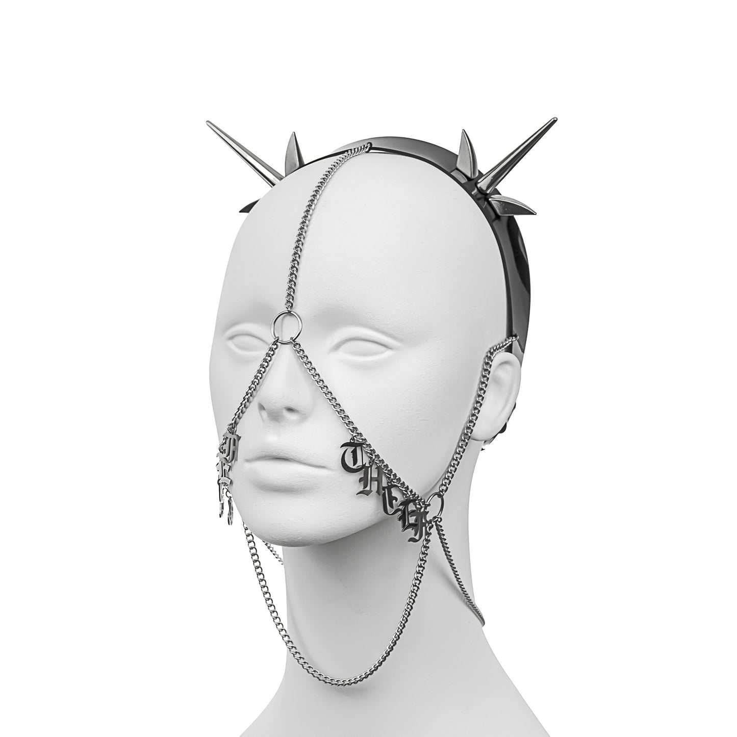Dark gothic-style headdress with a PVC headband, silver spikes, and draping chains, featuring 'THIEF' in stainless steel gothic lettering across the left cheek, part of 'GRIEF THIEF'.