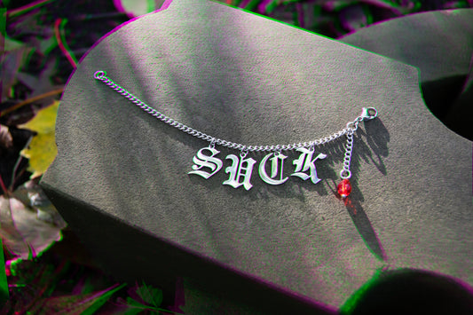 Custom Gothic nose piercing jewerly with vampire lyric and blood droplet earring.