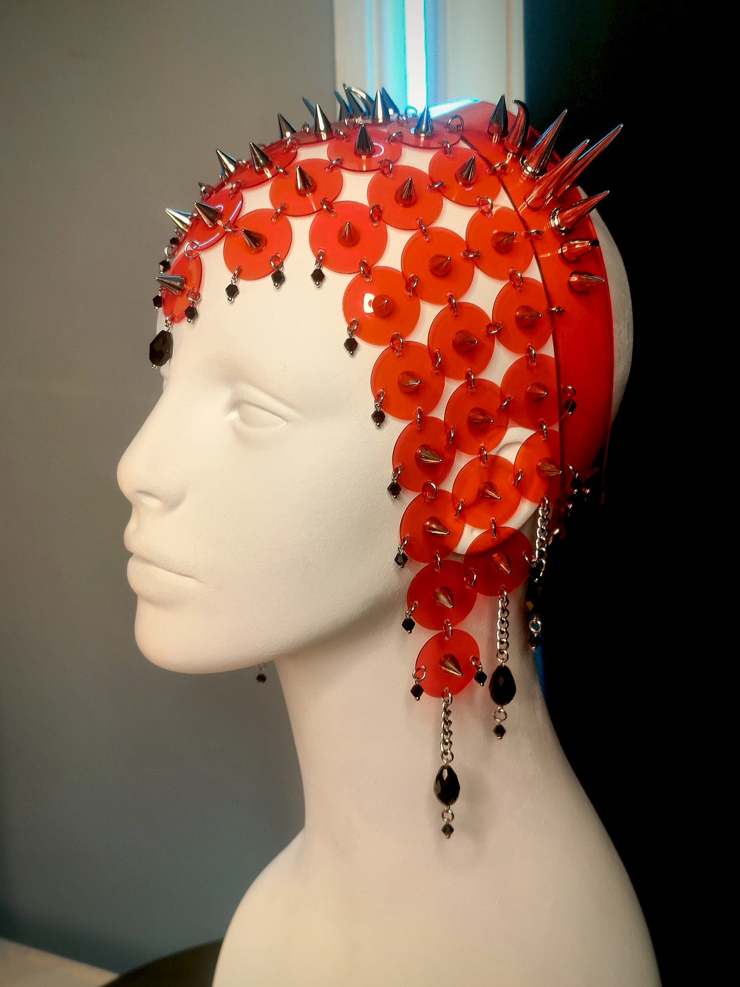 Intricate gothic translucent red PVC headdress with symmetrical double spike clusters, delicate chains, and black glass teardrop beads.