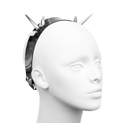 Side profile of an industrial black PVC headband with two clusters of silver spikes. Each cluster includes a  central spike flanked by two dragon claw spikes, highlighting its sharp, angular design.