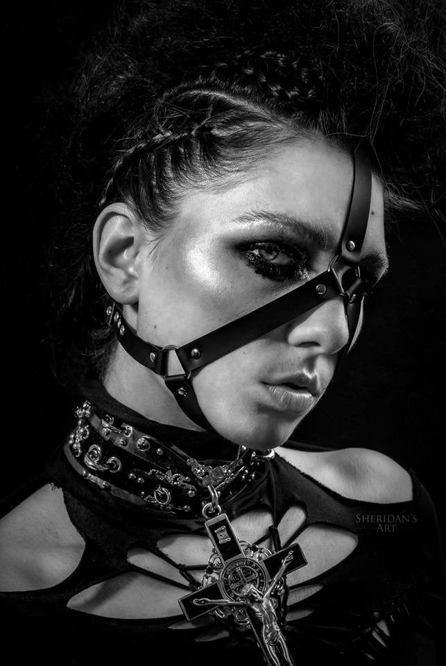 Fantasy model wearing a minimalist face harness