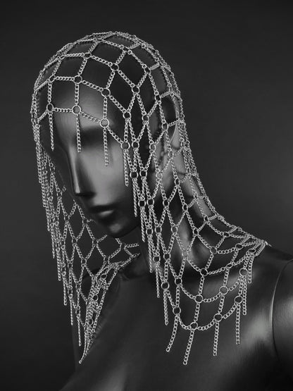 A silver chain mesh head net with dangling chain fringes displayed on a dark mannequin head and shoulders against a dark gray background. Fantasy handmade armour inspired headwear for cosplays and events.