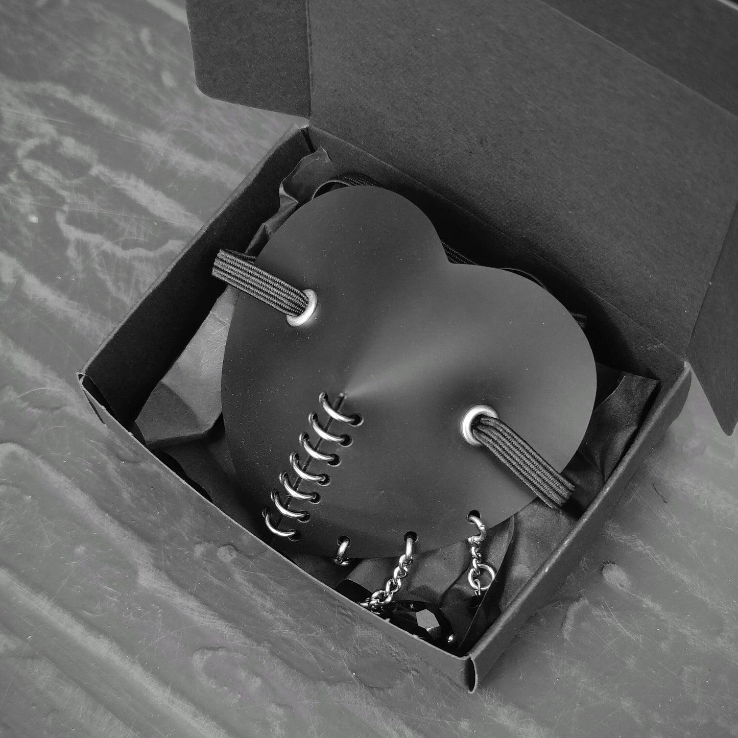 Black heart shape costume eye patch with black glass tear droplets and chain face jewerly.