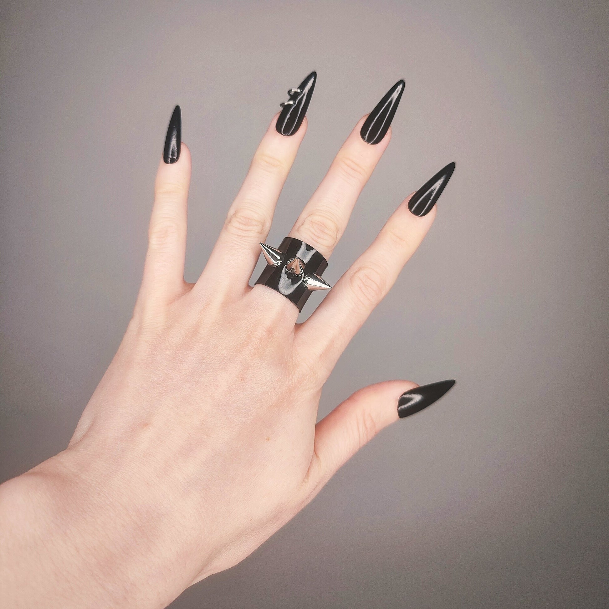 Spike black ring.