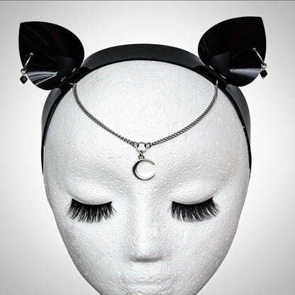 Cat Ear Headband with crescent moon forehead pendant, pierced ears with black gem. Front view 