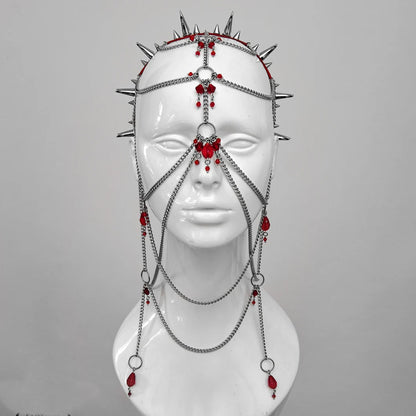 Elaborate gothic headdress with a red PVC headband, clusters of spikes, and stainless steel chains and red glass beads face jewellery.